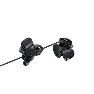 Black plastic mini hair claw clips, cute floral and geometric design for women and kids.