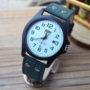 Matte military watch with green leather strap, clear dial and calendar. Detail view of watch.