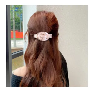 Fermaglio per capelli in acrilico marmo rosa elegante molletta ovale per donna styling quotidiano