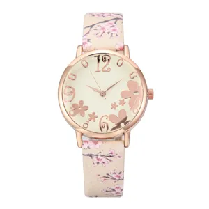 Cherry blossom floral leather strap women's quartz watch with elegant rose gold dial design.