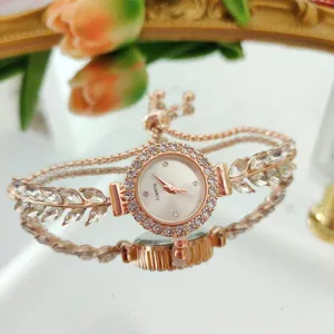 Roségold Strass Damen Quarzuhr mit Kristall Blatt Armband und verstellbarer Kette.