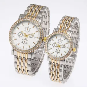 Couple quartz watch set, stainless steel two-tone strap, rhinestone bezel, white dial.