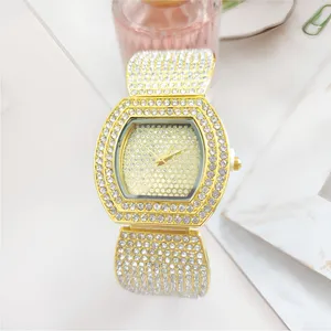 Luxe strass dames horloge goud tonneau quartz polshorloge sprankelend mode cadeau.