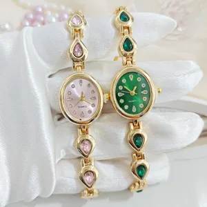 Luxury women quartz watch featuring elegant teardrop crystal links and stylish bracelet design.