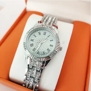 Zilveren strass dames horloge met romeinse cijfers en sprankelende sterrenhemel wijzerplaat.