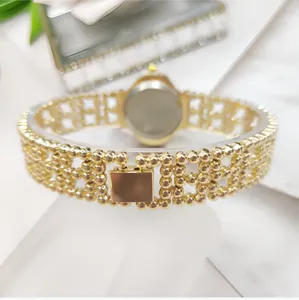 Orologio da polso donna oro con trifoglio, elegante orologio gioiello con strass brillanti.
