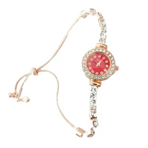 Élégante montre à quartz pour femme avec cadran rouge, lunette en cristal et bracelet réglable.