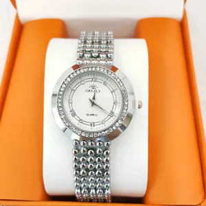 Silver rhinestone women's quartz watch with beaded strap, elegant Roman numeral dial detail.