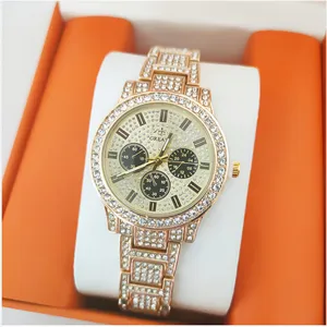 Luxe strass quartz horloge voor dames, gouden roestvrijstalen stalen armbandhorloge.