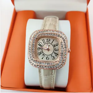 Square diamond women watch, quartz movement, elegant leather strap, sparkling rhinestone dial.