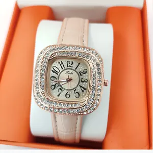 Square rhinestone women quartz watch with pink leather strap and clear digital dial details.