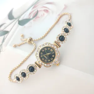 Gold quartz women watch with diamond crystal cluster and black bead bracelet pull chain style