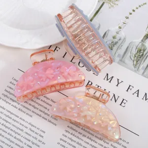 Molle per capelli a mezzaluna in acrilico con fiocchi e strass, accessori eleganti.