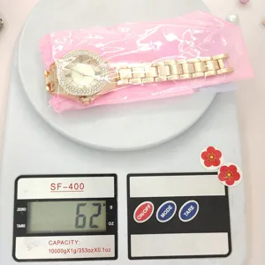 Dames strass quartz horloge met stalen band, sterren wijzerplaat design in zak.