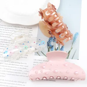 Set molletta per capelli in acrilico, design trasparente e perla per acconciature eleganti.