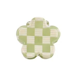 Molle per capelli a fiore a scacchi verdi, grazioso accessorio vintage per lo styling.