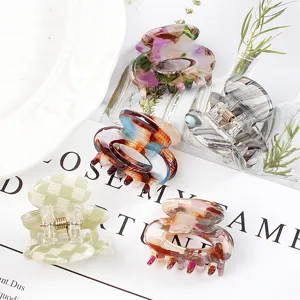 Set di mini mollette per capelli geometriche colorate in PVC per styling quotidiano.