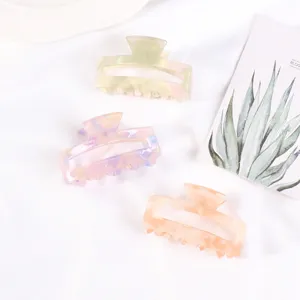 Set di mini mollette per capelli geometriche cave minimaliste, artigli in acetato marmorizzato.