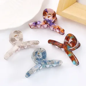 Elegante molletta per capelli in acrilico con design cavo retrò, colori marmorizzati chic.