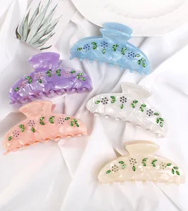 Molla per capelli in acetato con strass floreali, accessorio elegante per donna e ragazza.