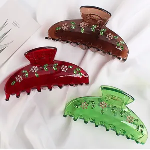 Set di mollette per capelli in acetato con fiori e foglie in strass brillanti per elegante stile.