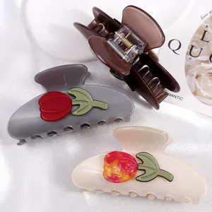Grandi mollette per capelli in resina con dettagli di tulipani, eleganti accessori per lo styling.