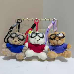 Cute aviator bear plush keychain backpack pendant with goggles, detailed view showing three styles.