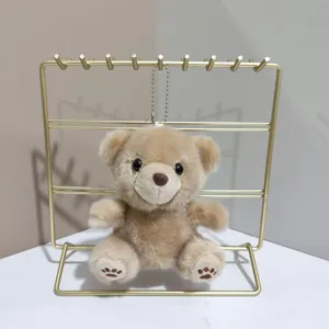 Detail pluche beren sleutelhanger, schattige bruine tasbedel pluche met metalen ketting.