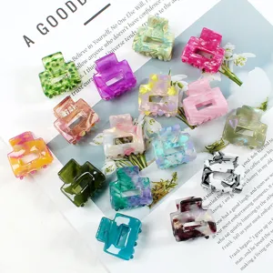 Piccoli artigli per capelli in acetato colorato accessori geometrici cavi per donne