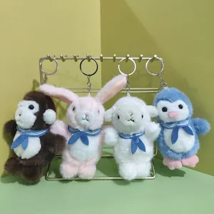 Cute plush animal keychain set featuring lovely rabbit, monkey, lamb, and penguin pendants.