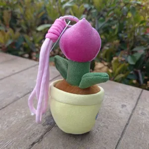 Joli porte-clés peluche pot de tulipe, adorable accessoire doux pour sac à main et jouet.