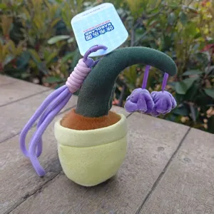Détail pendentif plante en peluche pot, jouet peluche porte-clés doux joli accessoire de décoration.