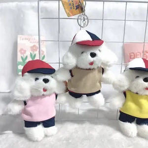 Cute puppy plush toy keychain with uniform vest and hat, soft fluffy doll bag charm.