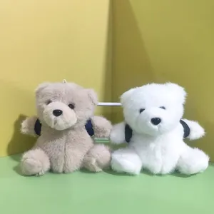 Süßer Plüschbär Puppen Detailblick, weiches Stofftier Rucksack Anhänger Spielzeug zweifarbig.