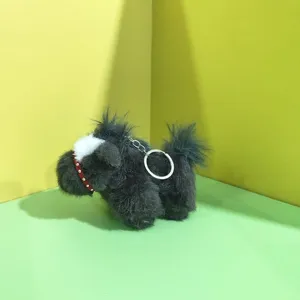Fluffy black pony plush keychain with red halter and metal ring for bag charm and gift.