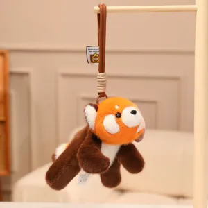 Adorable red panda plush toy pendant, soft stuffed animal doll for cute backpack and bag decor.