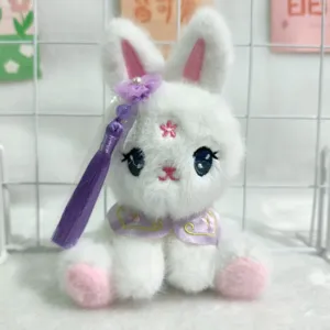 Süßer Plüsch Kaninchen Schlüsselanhänger für Tasche mit stilvoller Quaste und feiner Blumenstickerei.