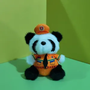 Cute panda plush toy pendant detail showing the soft fur texture, orange uniform and detailed stitching.