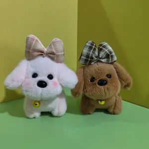 Simpatico ciondolo cucciolo di peluche con fiocco e campanella portachiavi borsa decoro