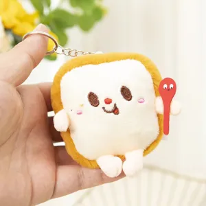 Cute plush toast bread keychain pendant, soft cartoon doll bag accessory for daily use.