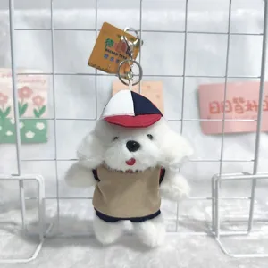 Cute plush puppy keychain detailed view, soft stuffed dog bag charm with uniform design.