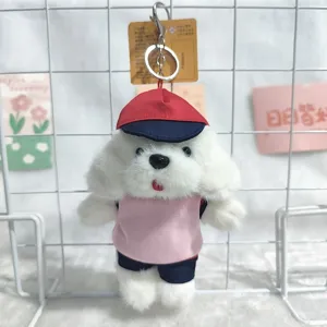 Cute plush dog keychain with uniform cap, soft stuffed animal bag charm for cute gifts.