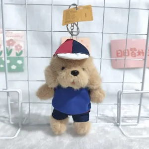 Cute plush puppy keychain with uniform hat and clothes, ideal bag hanging ornament toy.
