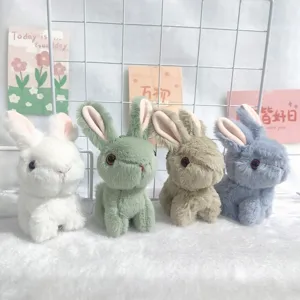 Fluffy plush bunny toy pendant detail, soft cute rabbit bag charm keychain decoration