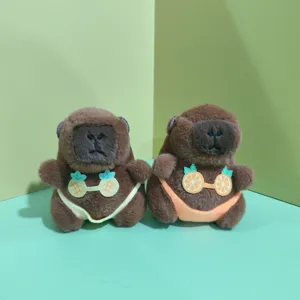Cute capybara plush pendant wearing mini bikini fruit design, soft stuffed doll bag accessory.
