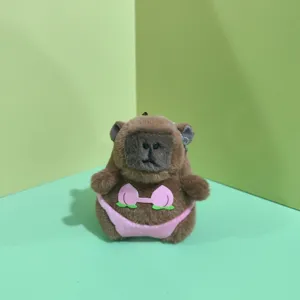 Cute capybara plush pendant toy wearing a funny pink bikini, soft stuffed doll keychain.