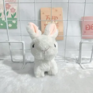 Cute white plush rabbit doll pendant, soft toy keychain for bags and keys. Perfect gift accessory.