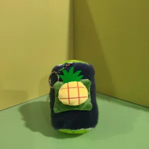 Detailed close-up of a cute cylindrical plush bread keychain featuring a pineapple plush charm.