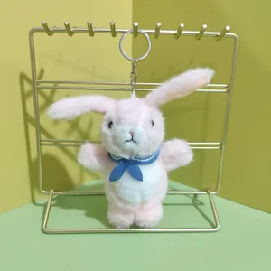 Cute pink plush bunny keychain plush toy doll with sailor collar, perfect bag charm accessory.