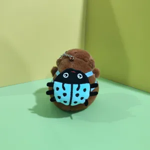 Cute capybara plush keychain with ladybug backpack, soft stuffed animal bag charm.